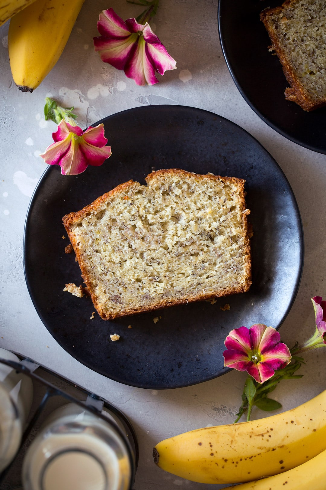 individual slice of banana bread on small plate