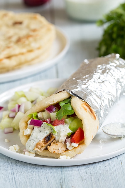 homemade Gyros with Greek Chicken & Tzatziki Sauce on a plate