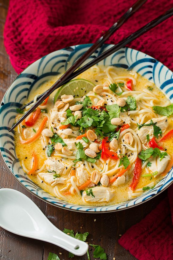large bowl of Thai Chicken Ramen with white spoon and chopsticks 