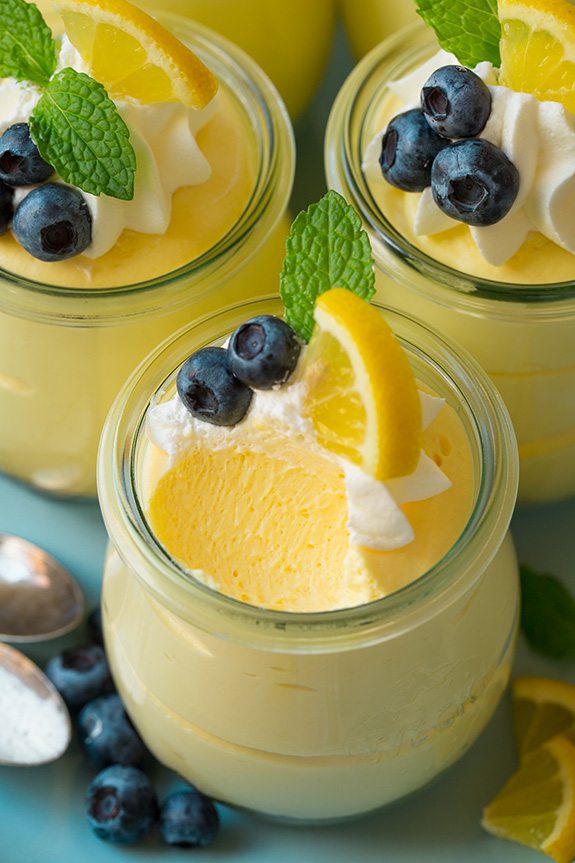 Close up of a Lemon Mousse with a spoonful missing