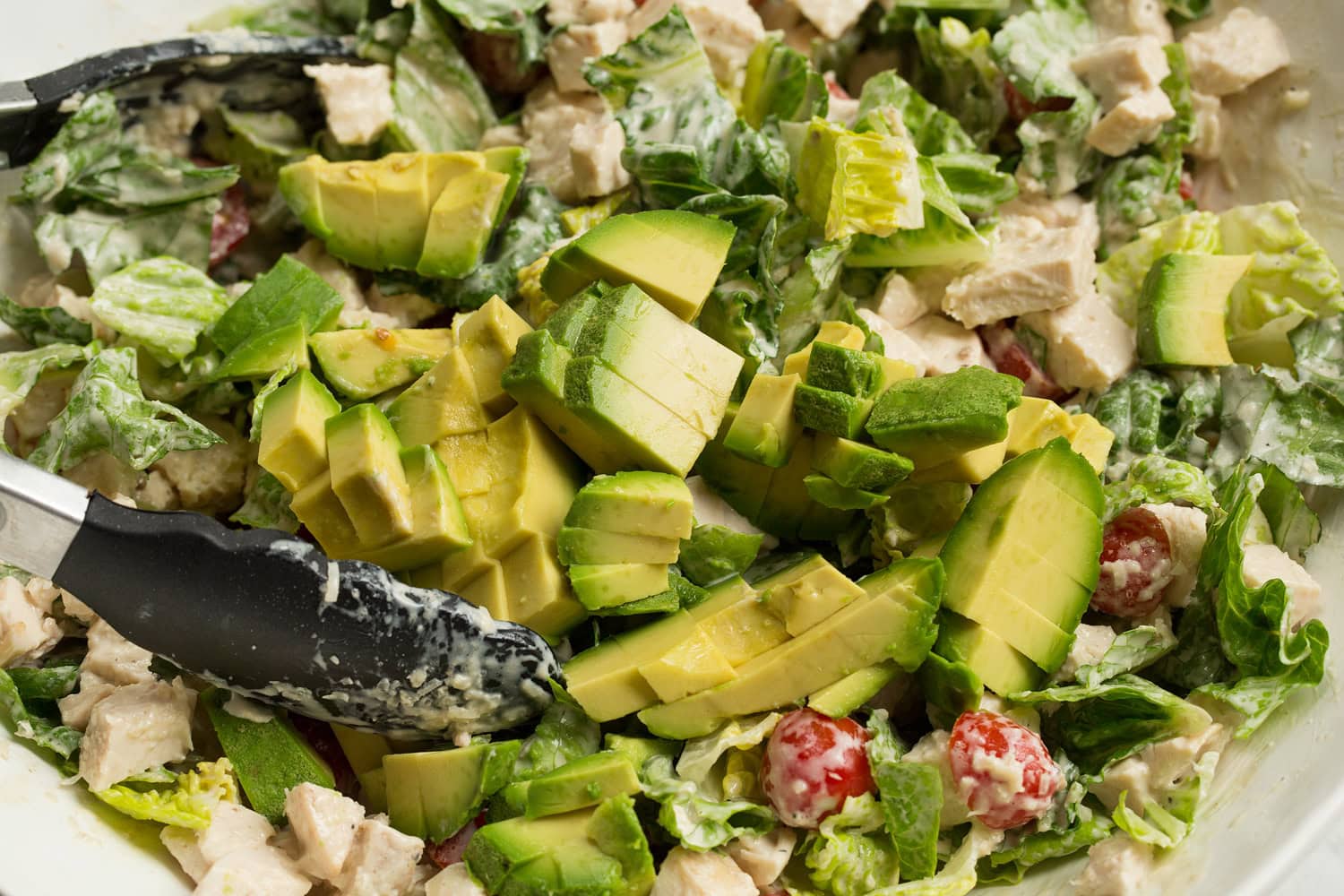 Diced avocado added to salad.