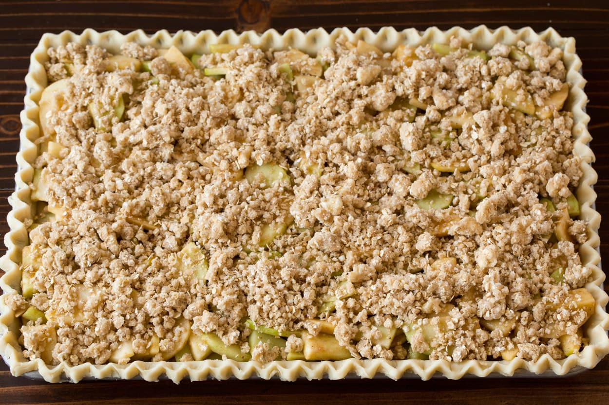 Crumb topping added to apple slab pie.