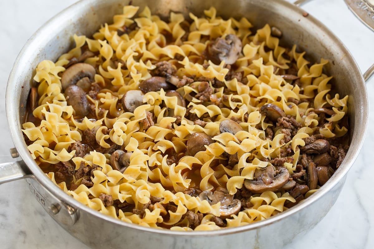 Adding chicken broth to saute pan for beef stroganoff