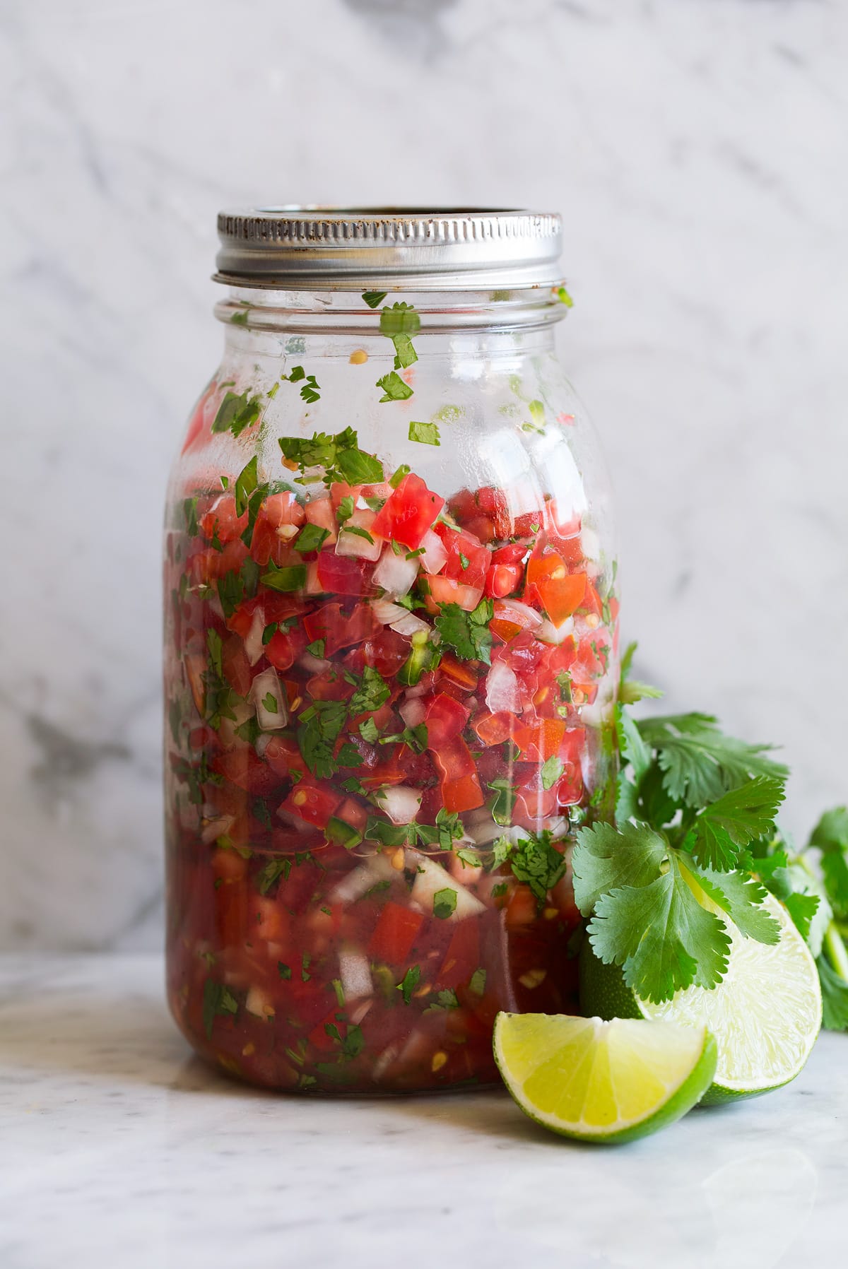 Pico de gallo in a mason jar.