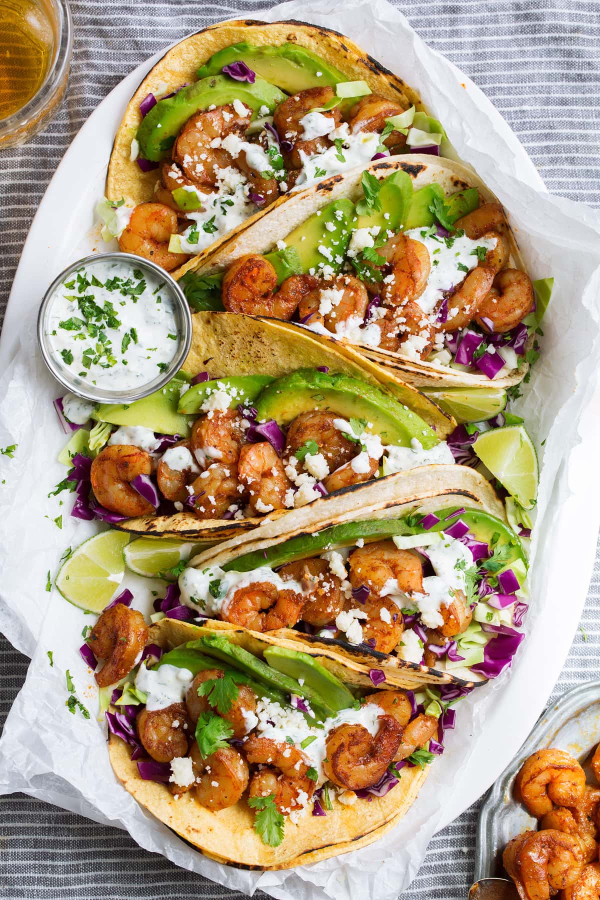 Platter full of shrimp tacos.