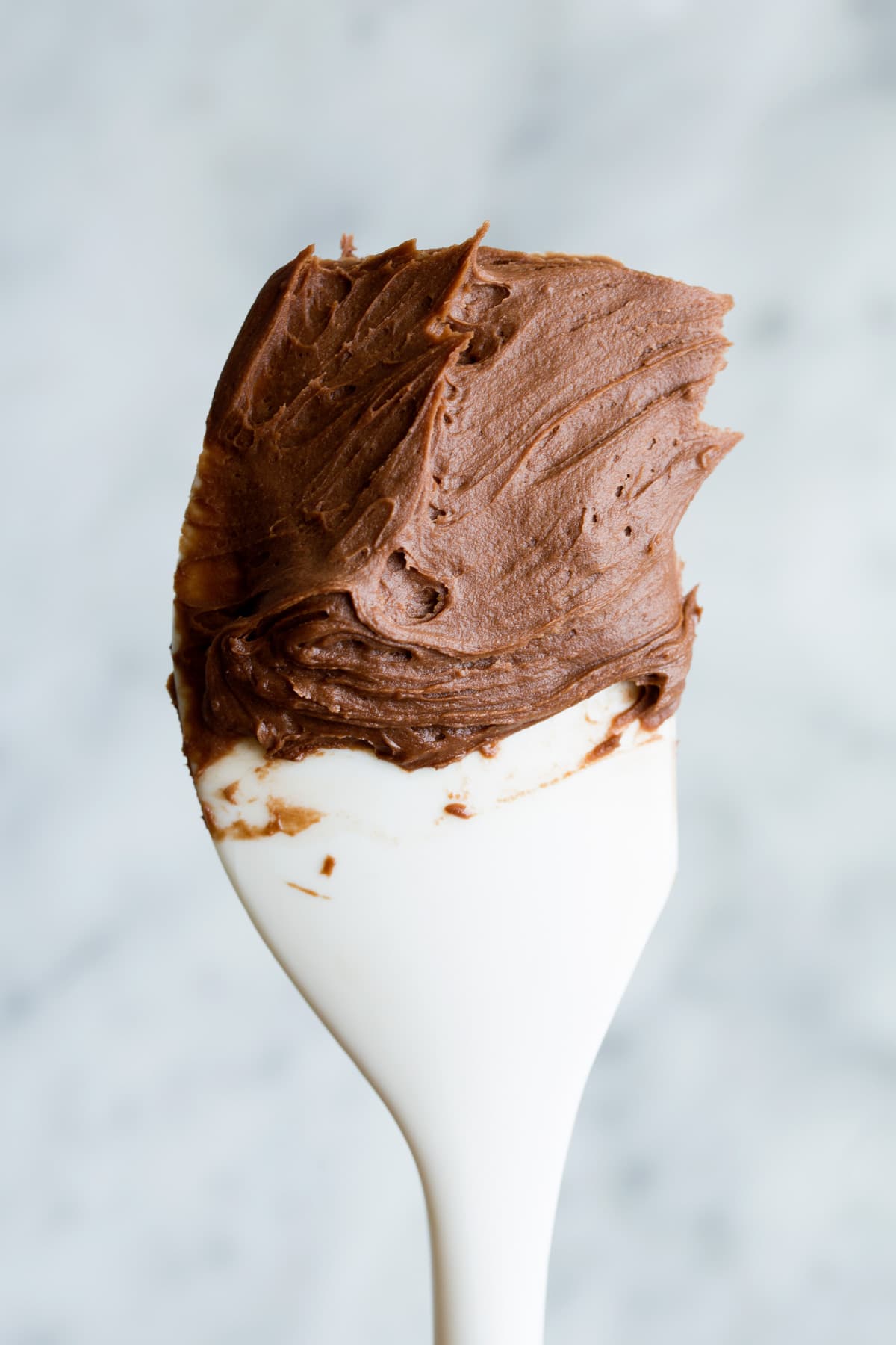 Chocolate frosting on a spatula