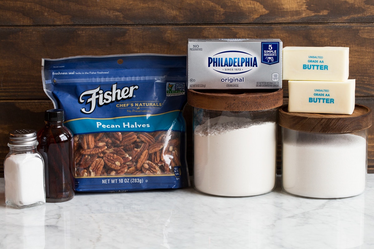 Image showing ingredients that go into cream cheese pecan cookies.