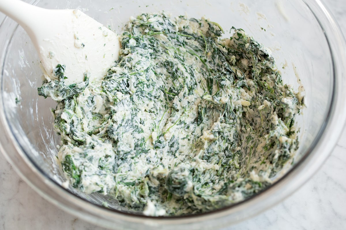 Stuffed mushroom filling shown after being blended in the glass mixing bowl.