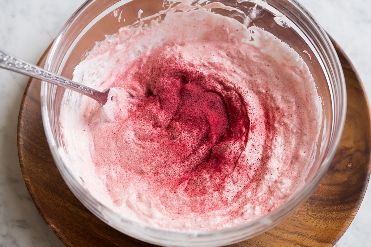 Fruit dip shown during mixing with a fork.