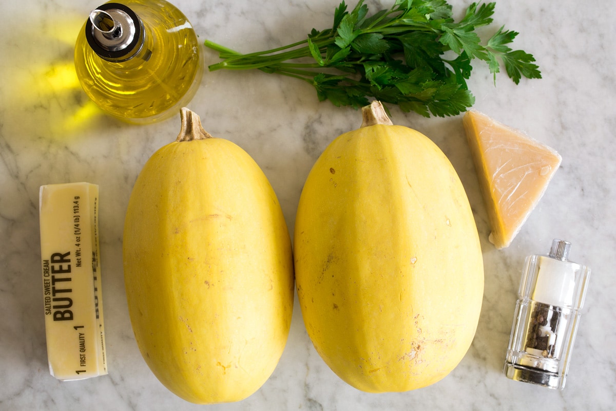 Image of spaghetti squash, olive oil, butter, parsley, parmesan, salt and pepper.