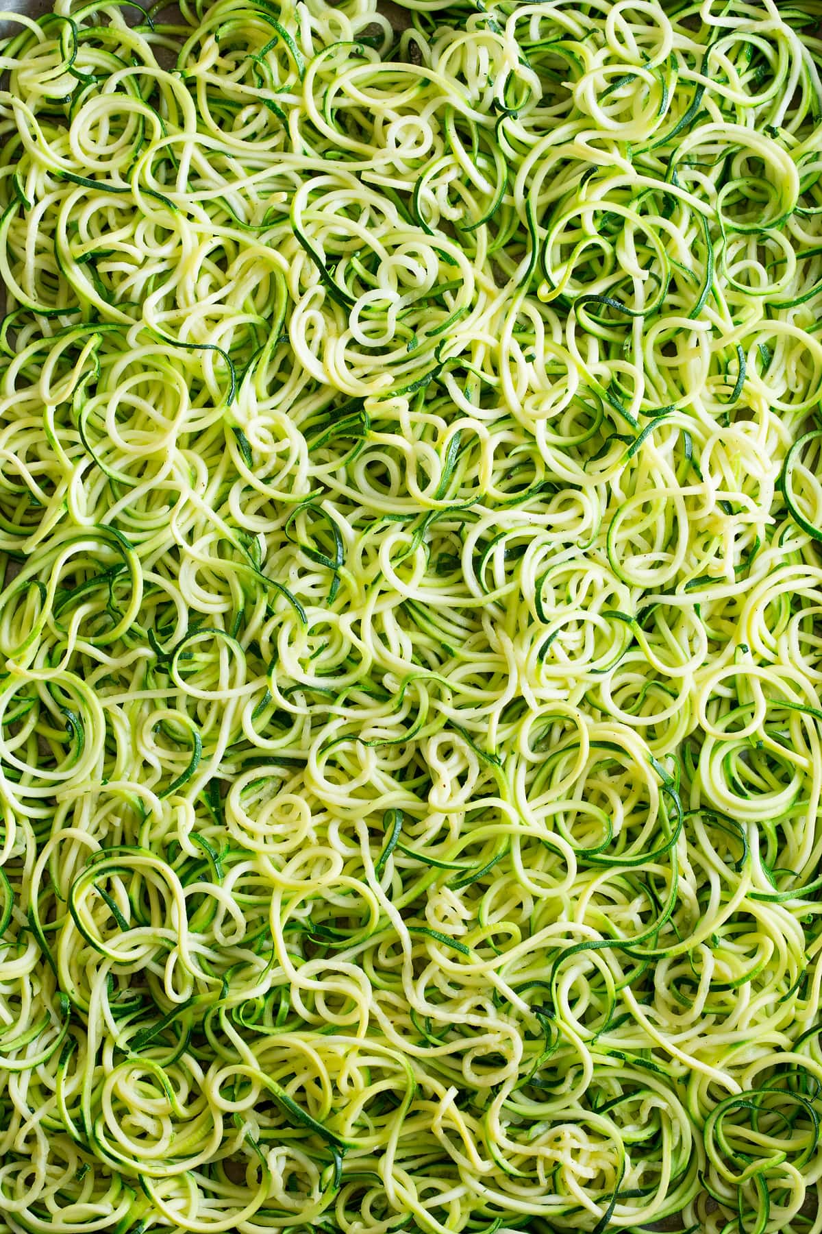 Close up photo of zucchini noodles.