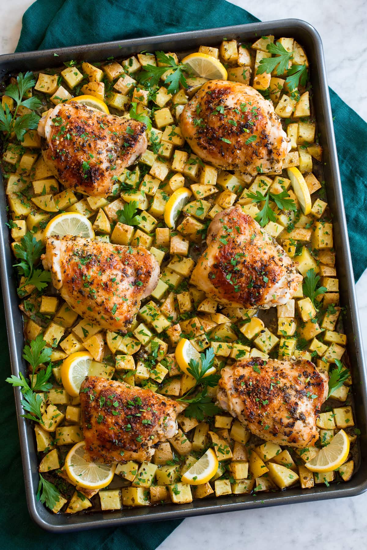 Overhead photo of baked chicken and potatoes.