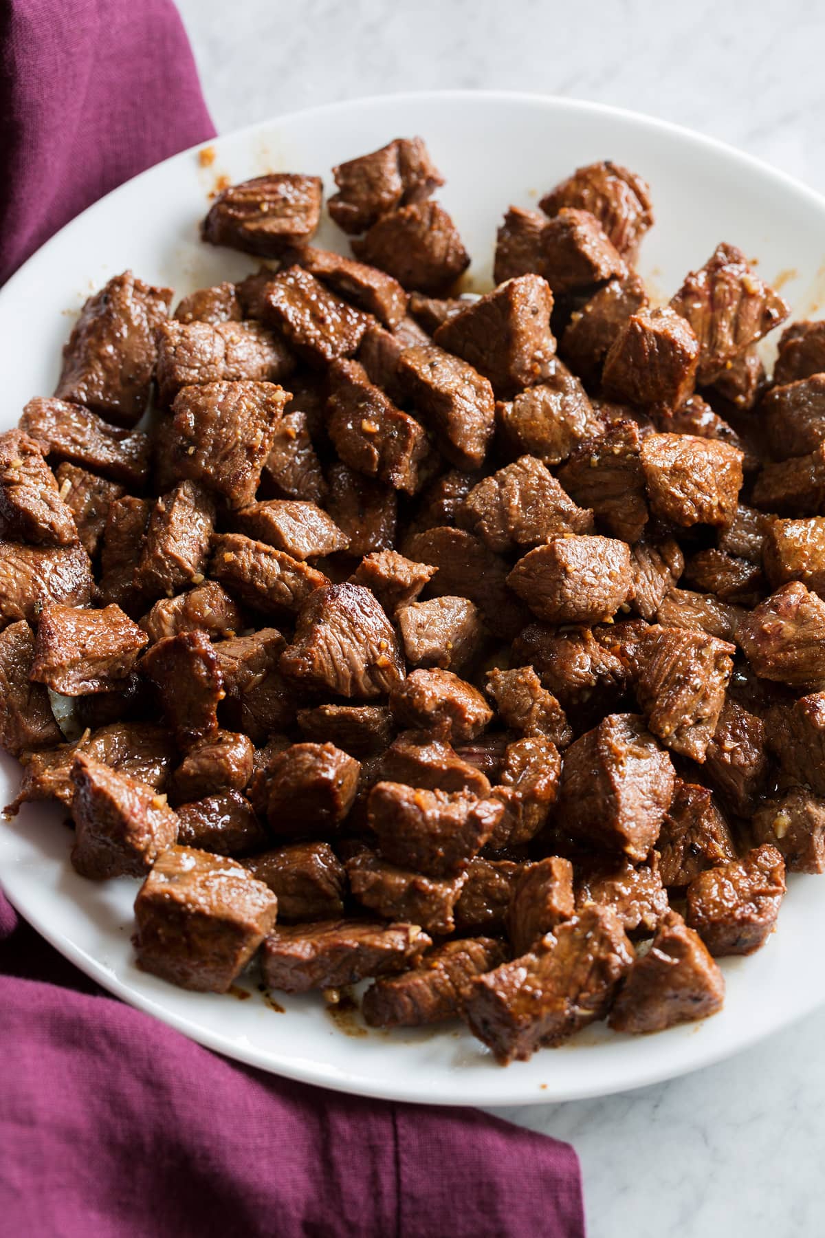 Photo of marinated and seared steak pieces for tacos.