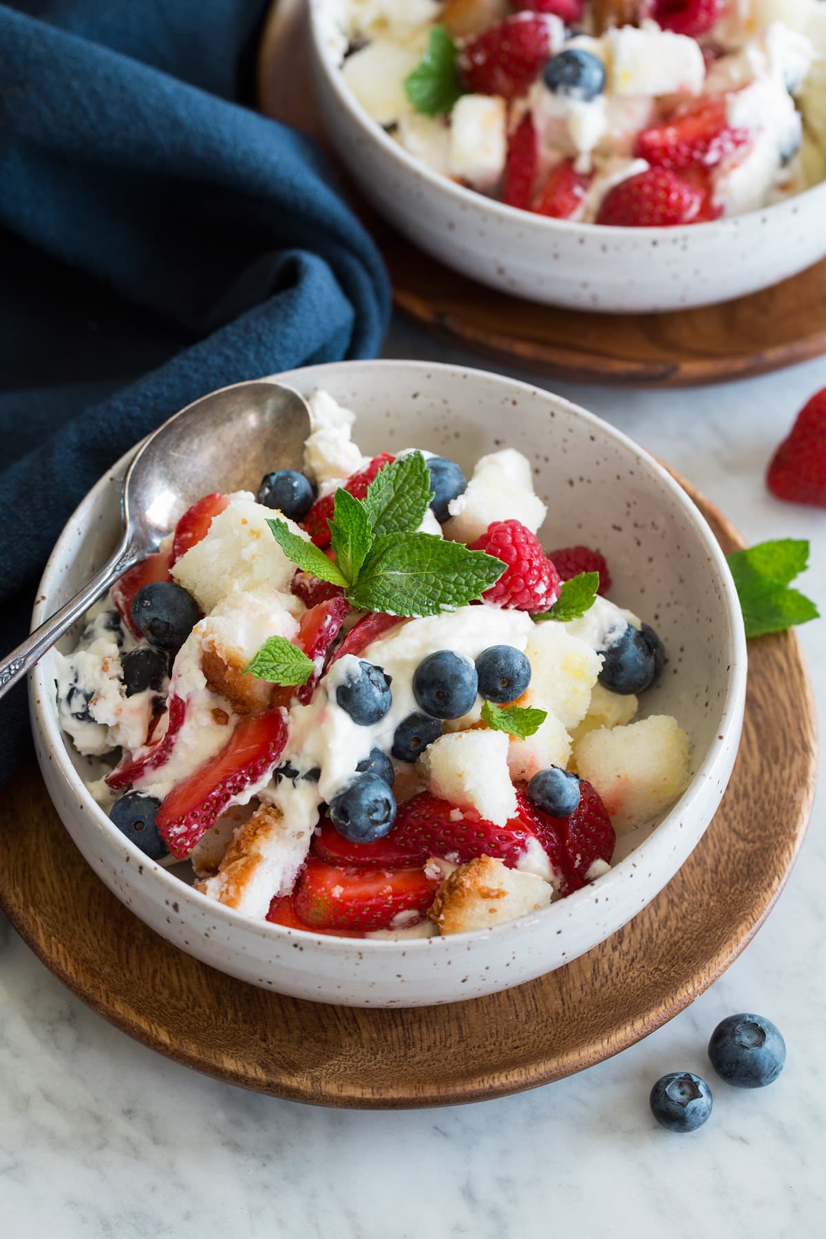 Trifle show in a single serving dish with a second serving in the background.