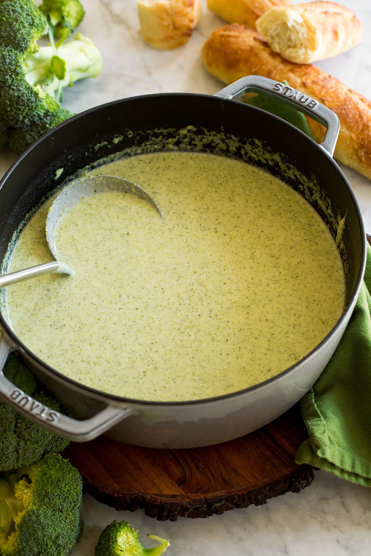 Pot filled with cream of broccoli soup.