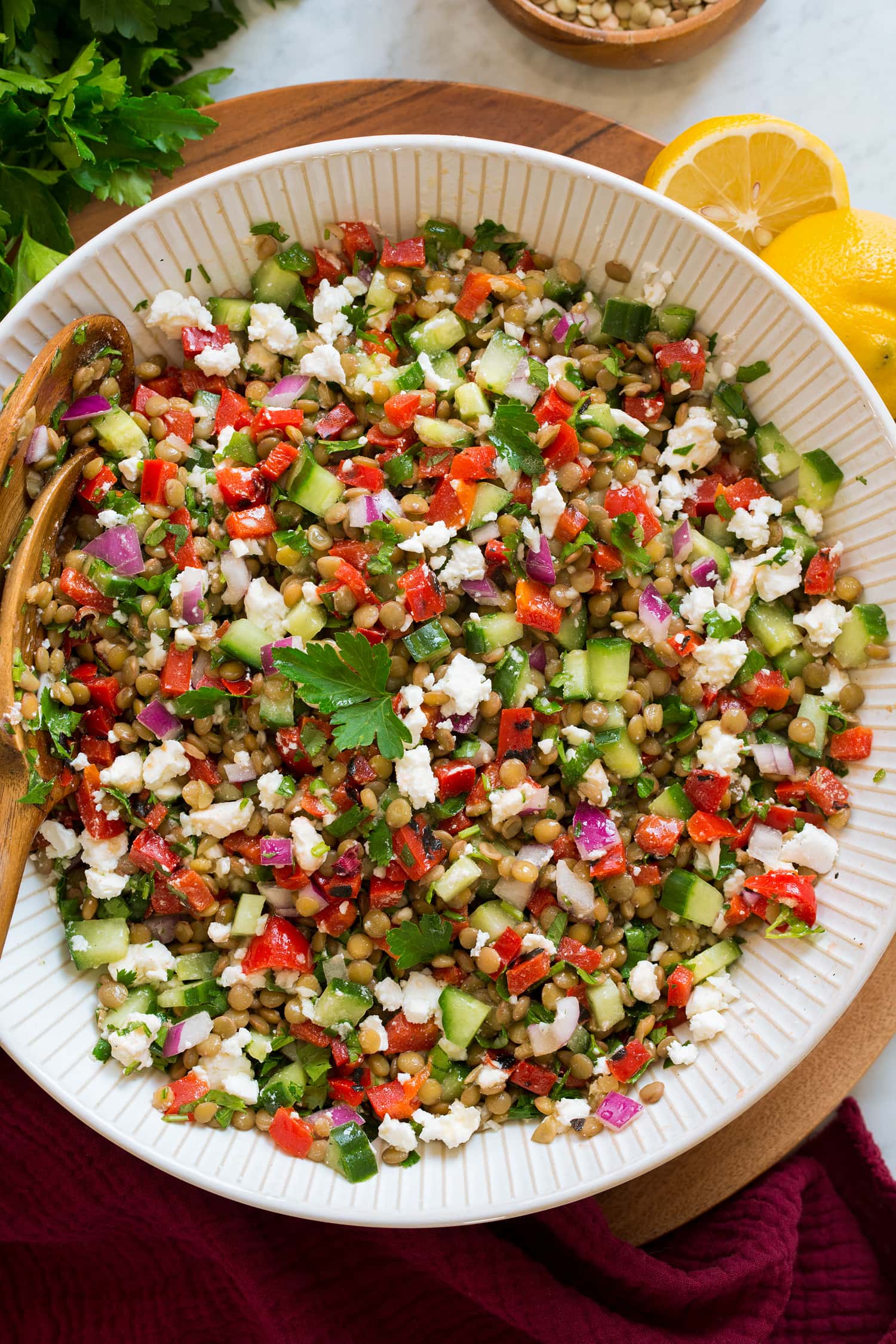 Overhead photo of lentil salad in a large serving bowl.
