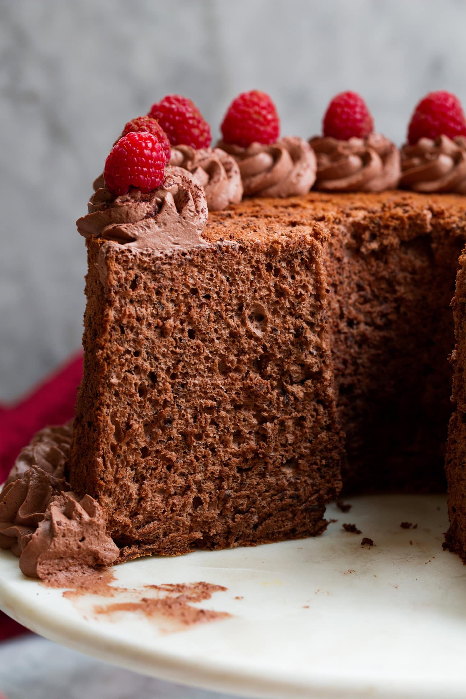 Chocolate angel food cake sliced into.
