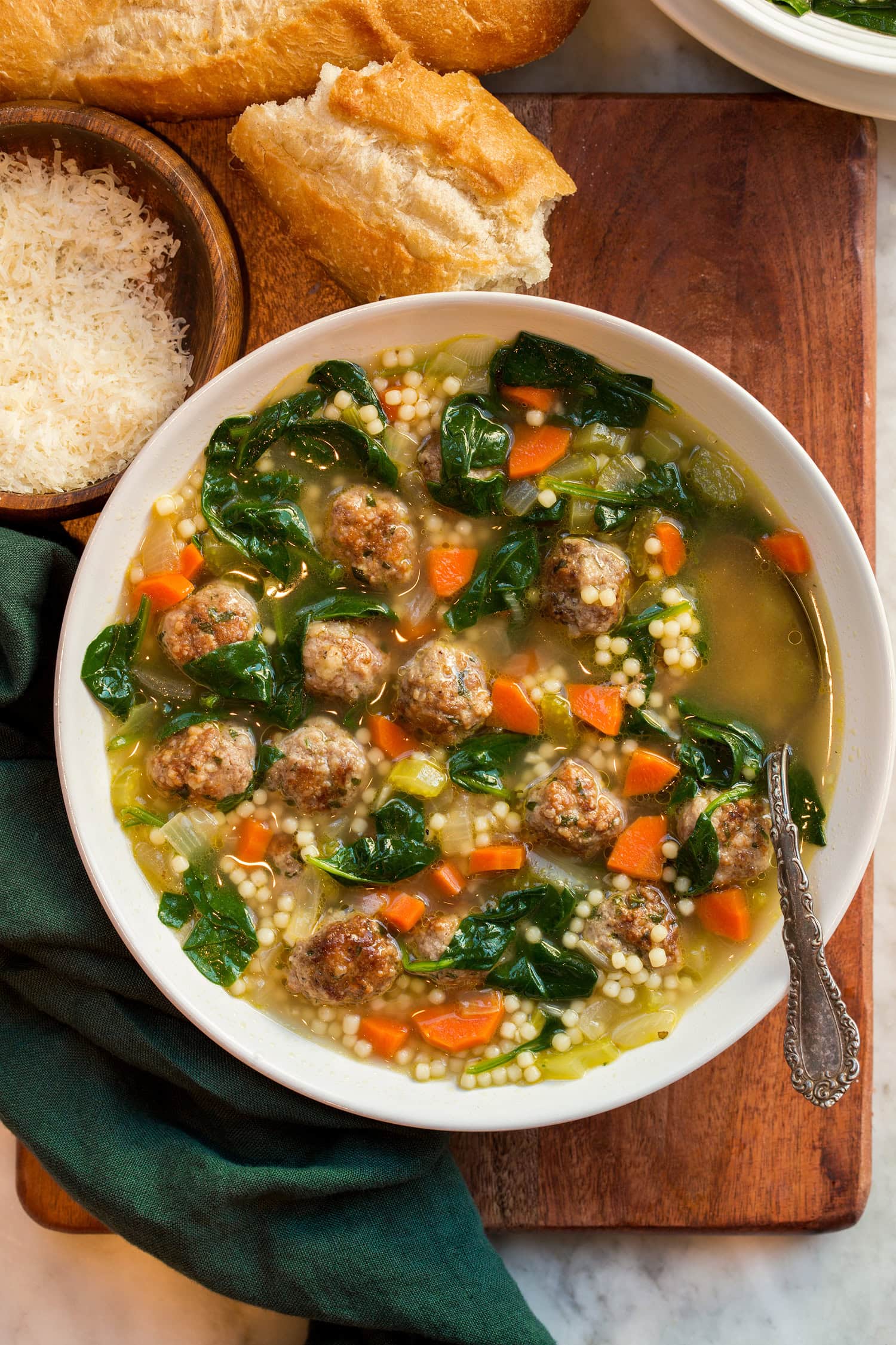 Overhead photo of single serving of Italian wedding soup.