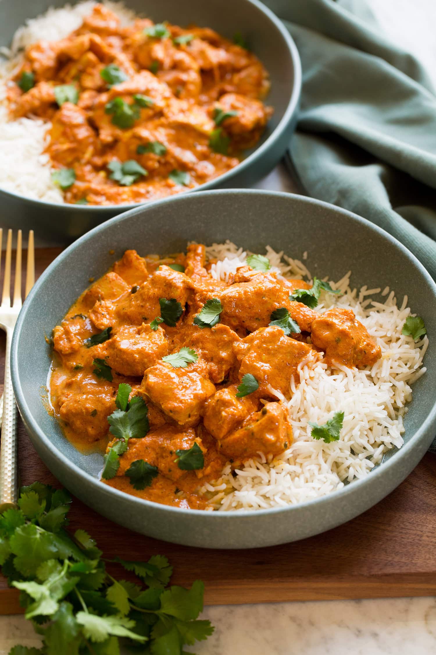 Slow cooker chicken tikka masala served with rice.