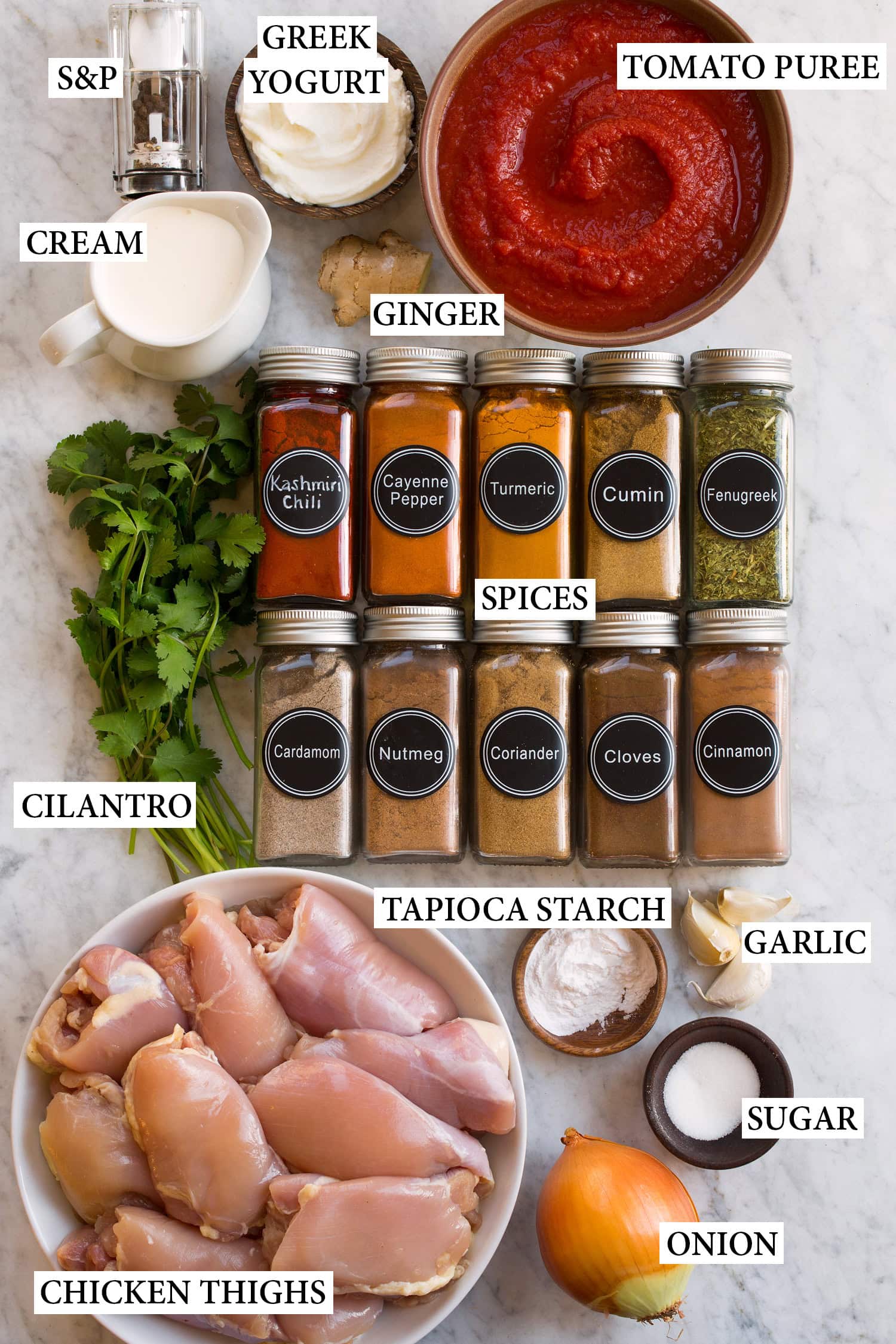 Ingredients used to make slow cooker chicken tikka masala.