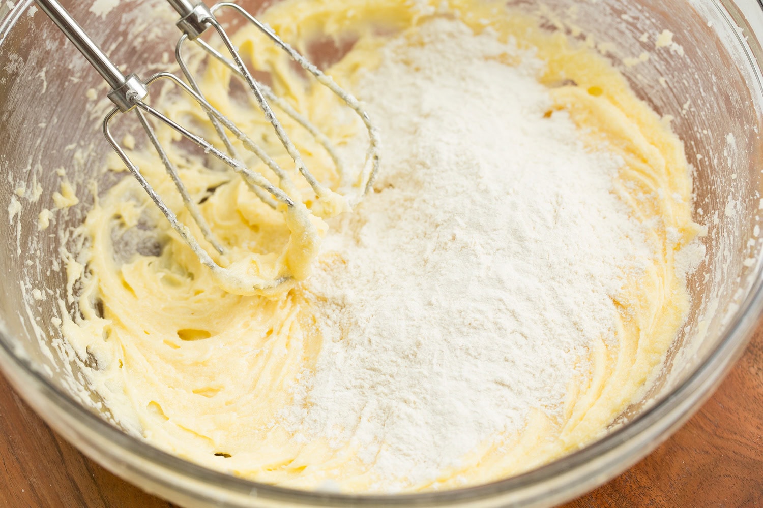 Flour mixture added to egg sugar mixture.