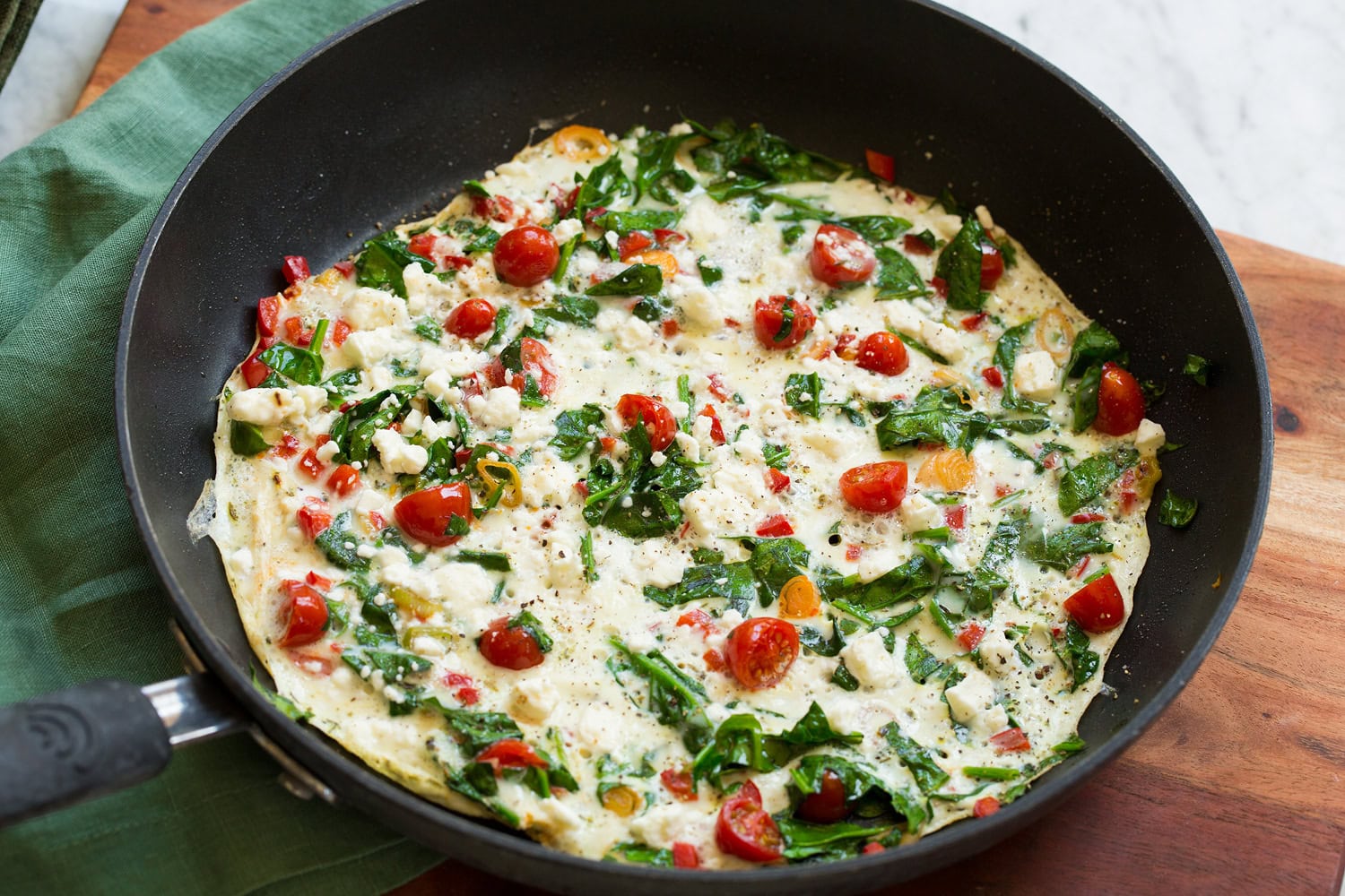 Egg white omelette shown in skillet after cooking through.